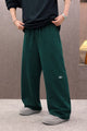 Alo Icons Pleated Loose Bottom Trouser In Dark Green