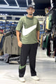 Nke Sport Core Men's Tracksuit In Green