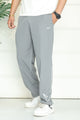 Nke Micron-Knit Throwback Sportswear Trouser In Light Grey
