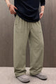 Alo Icons Pleated Loose Bottom Trouser In Skin